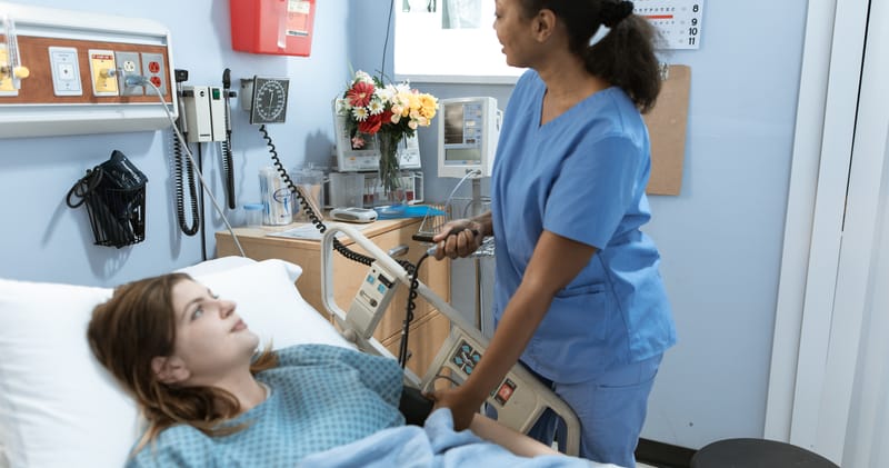 Nurse measuring the Blood Pressure of a Patient
