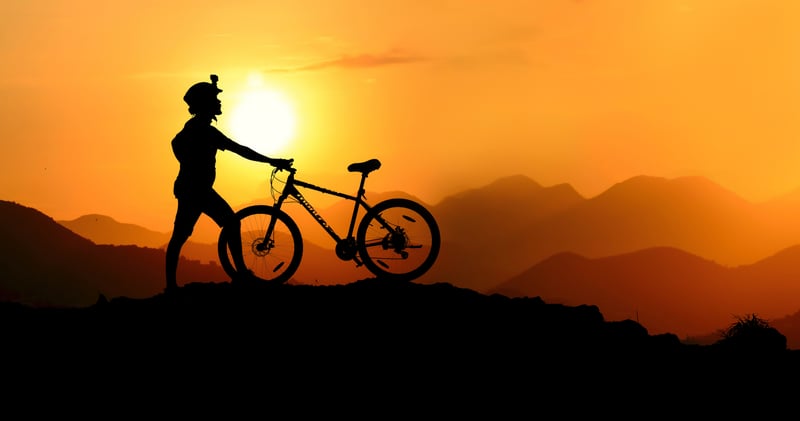 Silhouette Photography of Biker on Top of Hill
