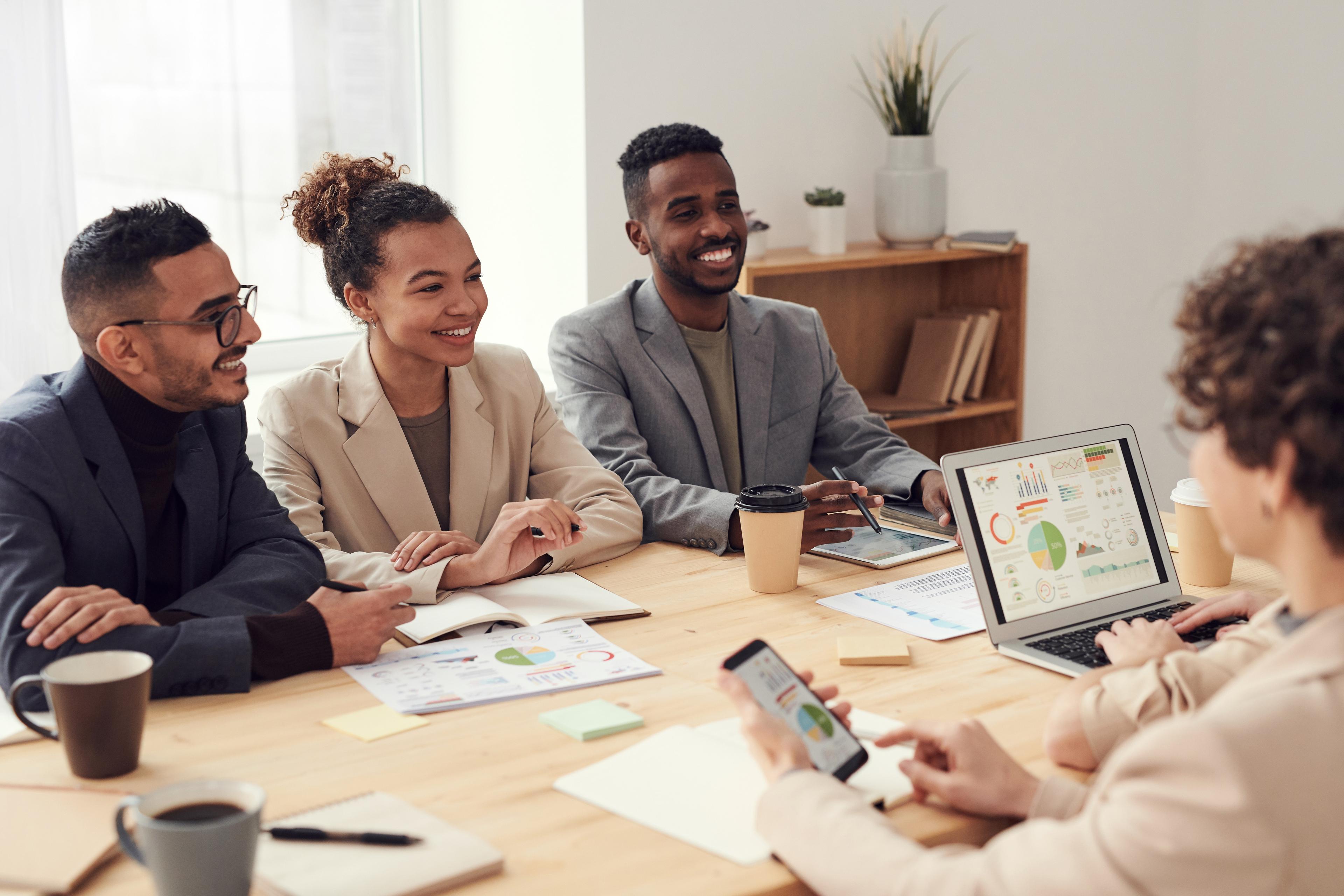 Coworkers smiling in meeting
