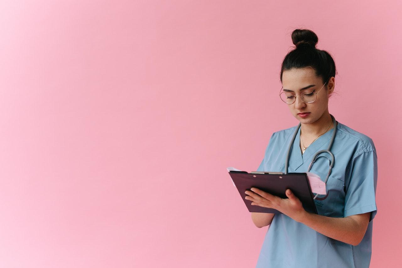 Nurse holding a tab