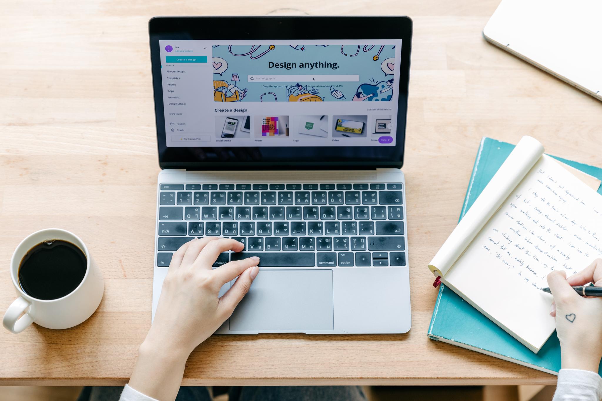 Person using a design tool on a laptop, from the UX designer career guide